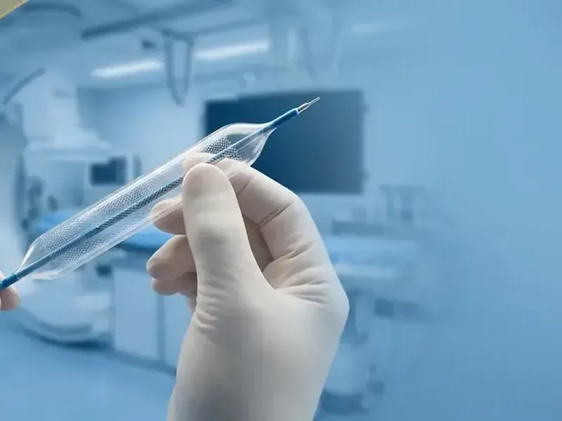 Stent coronario montado en balón de angioplastia